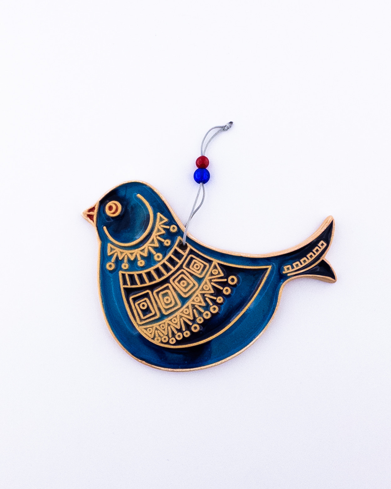 آویز خشتی پرنده با نقوش هندسی – هنر دستی برای دکور و هدیه‌ای نمادین