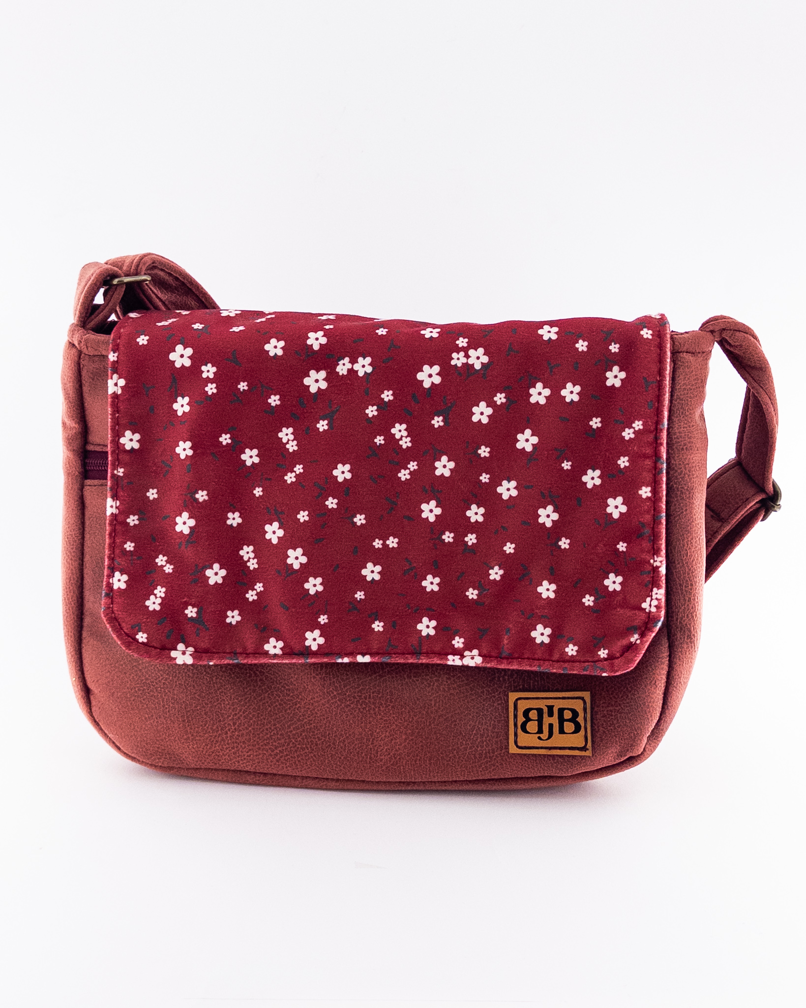 کیف دوشی زنانه مخملی دست‌دوز با رنگ زرشکی و طرح گل‌ریز – لطافت شاعرانه برای استایل‌های خاص