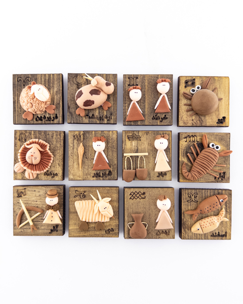 پک مگنت خمیری دست‌ساز روی چوب با نماد ماه های تولد